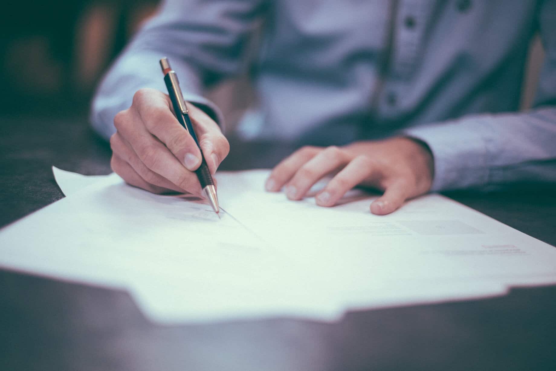 person filling in forms